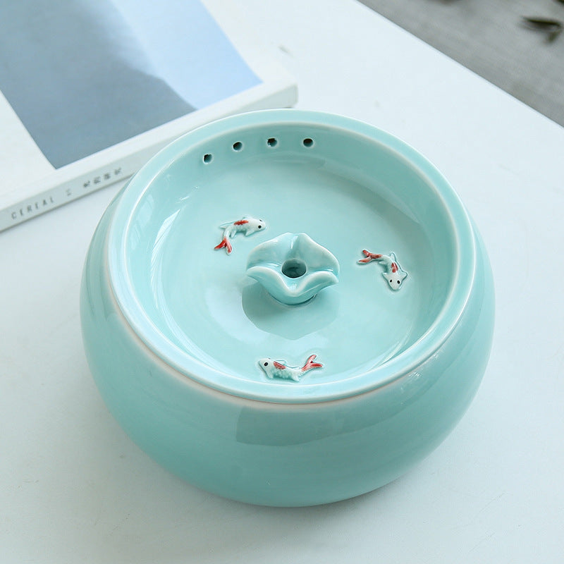 Elegant Artisan ceramic cat fountain